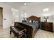 Luxurious main bedroom featuring a decorative headboard, ceiling fan, and bright windows at 2066 N Canelo Hls, Mesa, AZ 85207