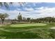 Community putting green offering a space to practice golf and enjoy the outdoors at 2066 N Canelo Hls, Mesa, AZ 85207