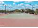 Well-maintained tennis court with mountain views, perfect for recreational play and exercise at 2066 N Canelo Hls, Mesa, AZ 85207
