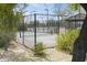 Community tennis and pickleball courts with surrounding desert landscape and shaded pavilion at 2066 N Canelo Hls, Mesa, AZ 85207