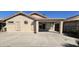 This is the exterior of the house, featuring a covered patio at 23167 W Lasso Ln, Buckeye, AZ 85326