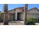 Charming single-story home with desert landscaping, a tile roof, and a two-car garage at 23167 W Lasso Ln, Buckeye, AZ 85326