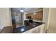 Well-equipped kitchen with granite countertops, modern appliances, and ample cabinet space at 23167 W Lasso Ln, Buckeye, AZ 85326