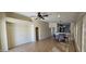 Spacious living area with neutral paint, tile floors, and dining space, offering a versatile layout at 23167 W Lasso Ln, Buckeye, AZ 85326