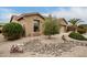 Charming single-story home with well-maintained desert landscaping at 24824 S Golfview Dr, Sun Lakes, AZ 85248