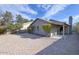 Spacious backyard features a brick-paved area, providing ample space for entertaining and relaxation at 26 S Tiago Dr, Gilbert, AZ 85233