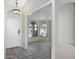 Welcoming foyer with tile flooring and view to the home's interior at 26 S Tiago Dr, Gilbert, AZ 85233