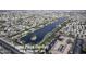 Aerial view of Lake Playa Del Rey in a residential community at 26 S Tiago Dr, Gilbert, AZ 85233