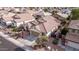 Aerial view of a home with tile roof, desert landscaping, and front-facing garage at 3401 E Isaiah Ave, Gilbert, AZ 85298