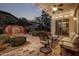 Covered patio with ceiling fan, tiled flooring, outdoor furniture, and a decorative water feature in the backyard at 3401 E Isaiah Ave, Gilbert, AZ 85298