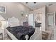 Comfortable bedroom with ceiling fan and mirrored closet doors at 3401 E Isaiah Ave, Gilbert, AZ 85298