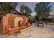 Elegant outdoor fountain with decorative tiling, creating a serene backyard ambiance at 3401 E Isaiah Ave, Gilbert, AZ 85298