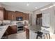 Kitchen showcases stainless appliances, center island, and plenty of counter space for cooking prep at 3401 E Isaiah Ave, Gilbert, AZ 85298