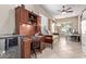 Spacious home office with a large desk and comfortable seating areas at 3401 E Isaiah Ave, Gilbert, AZ 85298