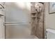 Updated shower with a glass enclosure and a tiled surround at 3401 E Isaiah Ave, Gilbert, AZ 85298