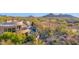 Expansive property featuring a beautiful pool and lush desert landscaping from an aerial perspective at 34460 N 79Th Way, Scottsdale, AZ 85266