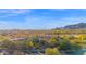 Expansive desert estate with a clay tile roof, native landscaping, and mountain views at 34460 N 79Th Way, Scottsdale, AZ 85266