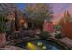Relaxing backyard with desert plants surrounding a small pool and stone accents, perfect for outdoor enjoyment at 34460 N 79Th Way, Scottsdale, AZ 85266