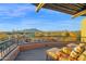Scenic balcony with mountain views and comfortable lounge chairs at 34460 N 79Th Way, Scottsdale, AZ 85266