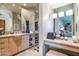 Bathroom features a vanity with a sink and makeup counter at 34460 N 79Th Way, Scottsdale, AZ 85266
