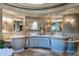 Luxurious bathroom with dual vanities, decorative lighting, and unique design at 34460 N 79Th Way, Scottsdale, AZ 85266