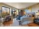 Primary bedroom suite with desert views and warm lighting at 34460 N 79Th Way, Scottsdale, AZ 85266