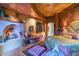 Serene main bedroom with a fireplace and luxurious decor at 34460 N 79Th Way, Scottsdale, AZ 85266
