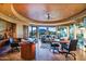 Spacious office with breathtaking mountain views and cozy seating at 34460 N 79Th Way, Scottsdale, AZ 85266