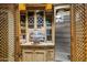 Pantry features custom shelving and stainless refrigerator at 34460 N 79Th Way, Scottsdale, AZ 85266