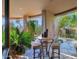 Inviting patio with lush greenery and comfortable seating area at 34460 N 79Th Way, Scottsdale, AZ 85266
