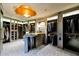 Spacious walk-in closet with custom shelving and unique ceiling design at 34460 N 79Th Way, Scottsdale, AZ 85266