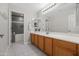 Bathroom with vanity and tiled shower and tub at 3456 E Joseph Way, Gilbert, AZ 85295