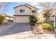 Two-story home with a well-maintained yard and desert landscaping at 363 E Leslie Ave, San Tan Valley, AZ 85140