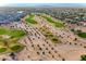 Overhead view of a lush golf course with manicured greens and tree-lined fairways in a beautiful community at 3706 E Ravenswood Dr, Gilbert, AZ 85298