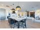 Beautiful eat-in kitchen featuring a large island, pendant lighting, and an open concept layout at 3706 E Ravenswood Dr, Gilbert, AZ 85298