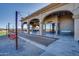 Spacious patio with bocce ball court, string lights, and mountain views at 3706 E Ravenswood Dr, Gilbert, AZ 85298