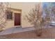 A welcoming front door with desert landscaping and an inviting entrance at 37379 W Amalfi Ave, Maricopa, AZ 85138