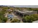 Aerial view of a Southwestern home with a pool and covered patio, surrounded by desert landscaping at 38820 N 10Th St, Phoenix, AZ 85086