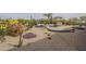 Backyard featuring pool area with desert landscaping including cacti, succulents and gravel at 38820 N 10Th St, Phoenix, AZ 85086