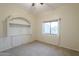 This bedroom features neutral walls, carpet and a built in wall unit for extra storage at 38820 N 10Th St, Phoenix, AZ 85086