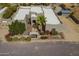 Aerial front view of a desert home with a landscaped front yard at 38820 N 10Th St, Phoenix, AZ 85086