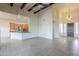 Bright living room leads seamlessly into a modern kitchen, creating an open and inviting living space at 38820 N 10Th St, Phoenix, AZ 85086