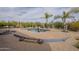Backyard featuring pool and spa with rock waterfall and lush desert landscaping at 38820 N 10Th St, Phoenix, AZ 85086