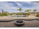 Backyard featuring an in ground pool with a stone patio and landscaping at 38820 N 10Th St, Phoenix, AZ 85086