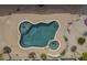 Aerial view of a backyard pool and spa, surrounded by a patio and desert landscaping at 38820 N 10Th St, Phoenix, AZ 85086