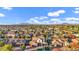 Expansive community view showcasing lush landscaping, mountain views, and a collection of beautiful single-Gathering homes at 3930 E Enrose St, Mesa, AZ 85205