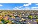 Neighborhood shot of mature landscaping, a stunning sunset sky, and many beautiful single-Gathering homes at 3930 E Enrose St, Mesa, AZ 85205
