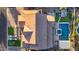 Home aerial view, highlighting the roof, back yard, patio, pool, and well landscaped hardscape at 3930 E Enrose St, Mesa, AZ 85205