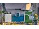Home's pool aerial view, showing hot tub, yard, patio, outdoor kitchen, and beautiful landscaping at 3930 E Enrose St, Mesa, AZ 85205