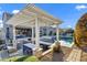 Amazing backyard with a covered patio, outdoor kitchen, pool, and spa, perfect for entertaining at 3930 E Enrose St, Mesa, AZ 85205